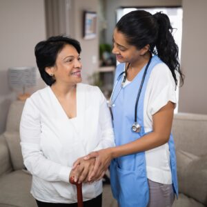 Young nurse standing with patient
